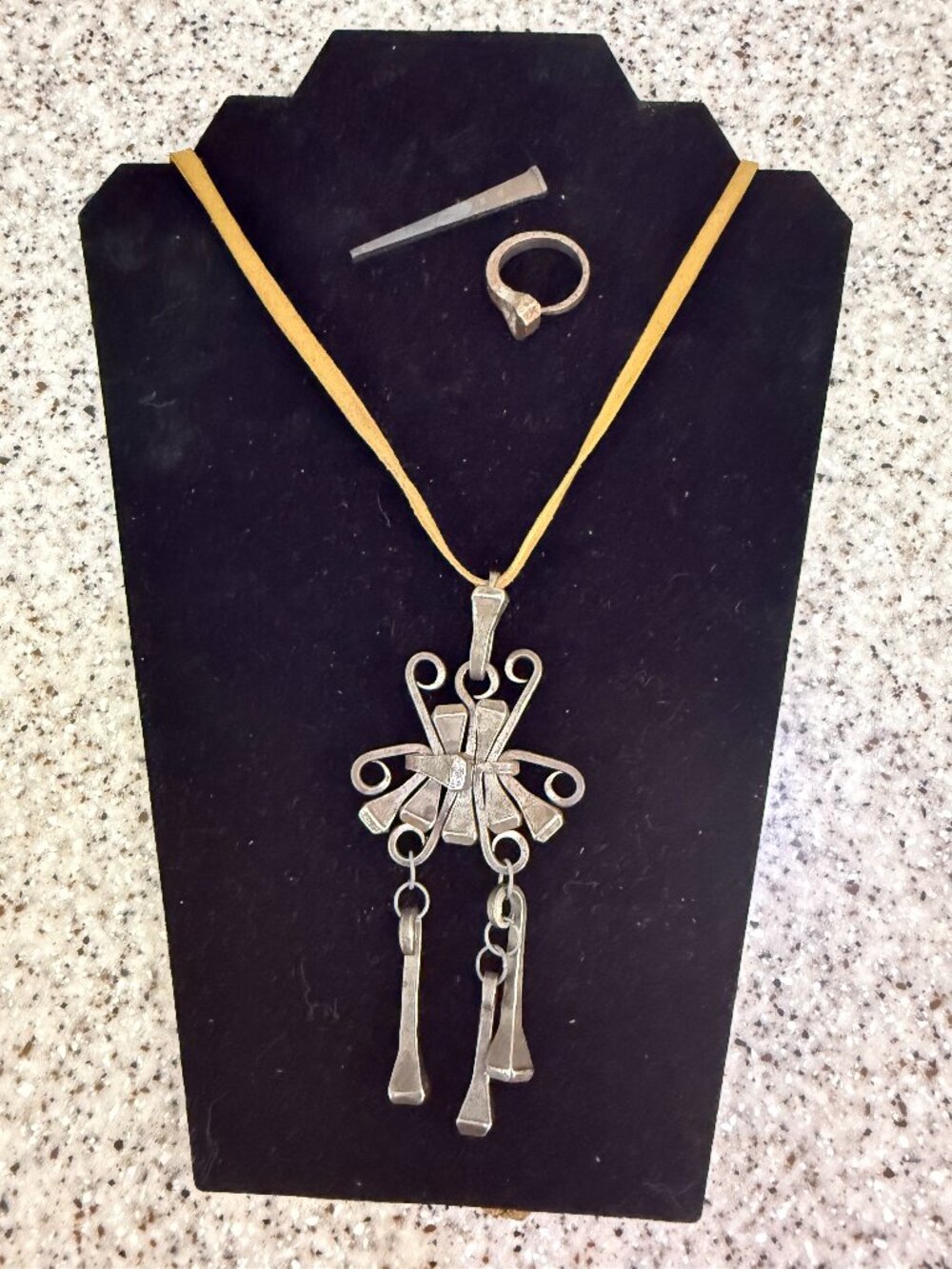 vintage brutalist handmade sculpture necklace made from horseshoe nails